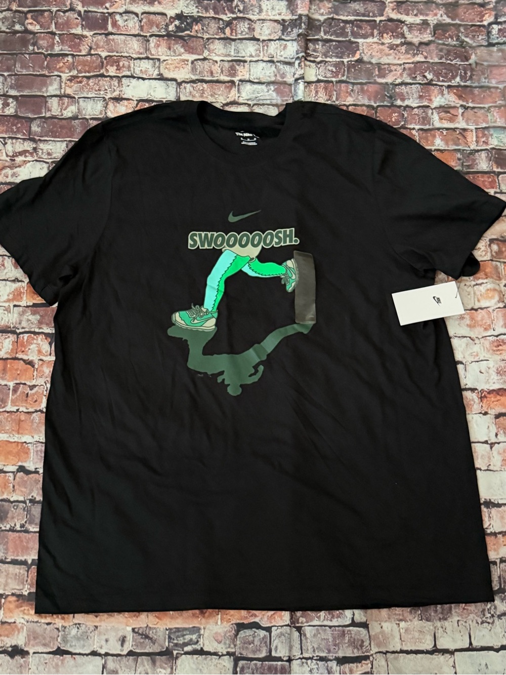Nike Black Tee with Green 'Swooooosh' Graphic